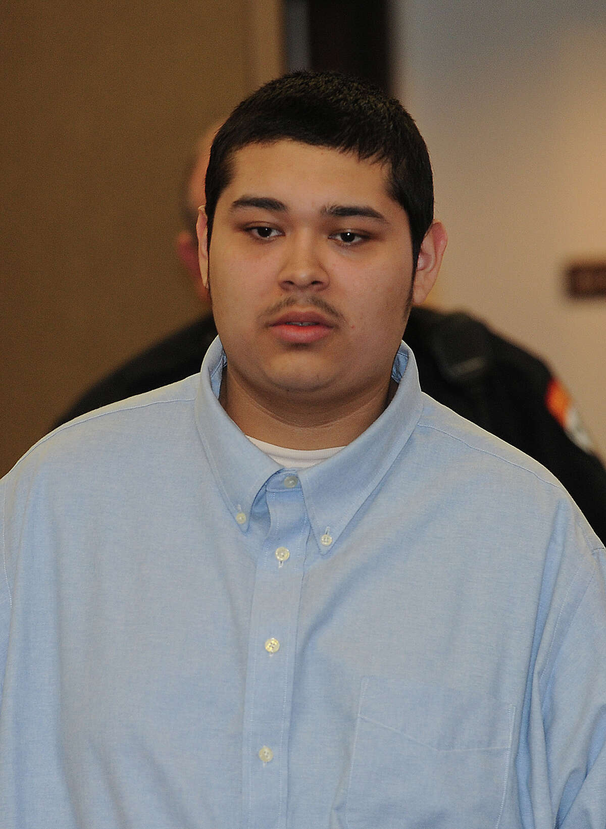 Jonathan Benitez enters Judge John Steven's courtroom on Tuesday to begin his manslaughter trial for the death of a 16-year-old girl in 2011. Photo taken Tuesday, January 24, 2012 Guiseppe Barranco/The Enterprise