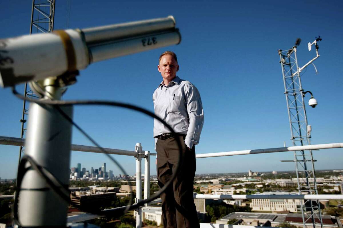 Barry Lefer, an atmospheric chemist and University of Houston professor, is part of an effort that will measure emissions. He stands at the Moody Tower air quality monitoring station on the UH campus.