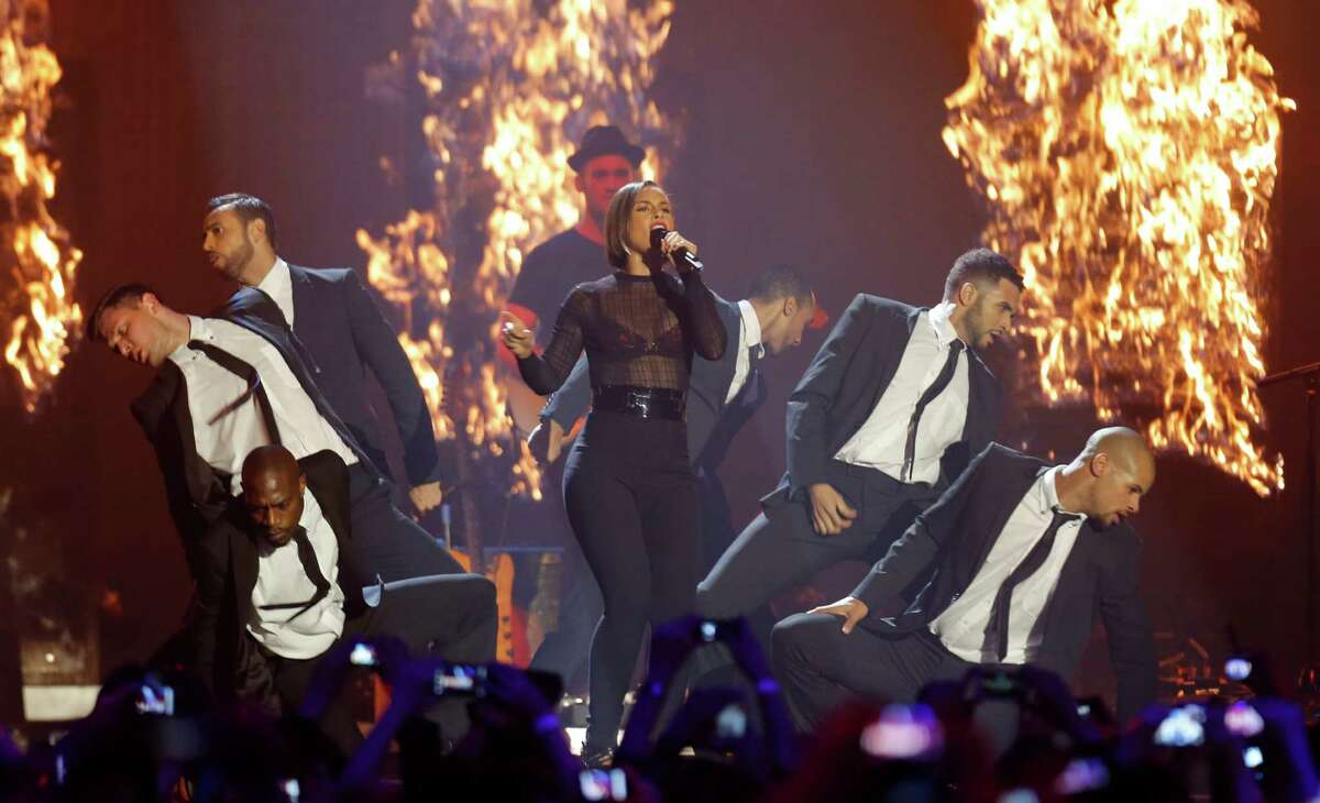 US singer Alicia Keys performs during the 2012 MTV European Music Awards show at the Festhalle in Frankfurt, central Germany, Sunday, Nov. 11, 2012. (AP Photo/Michael Probst)