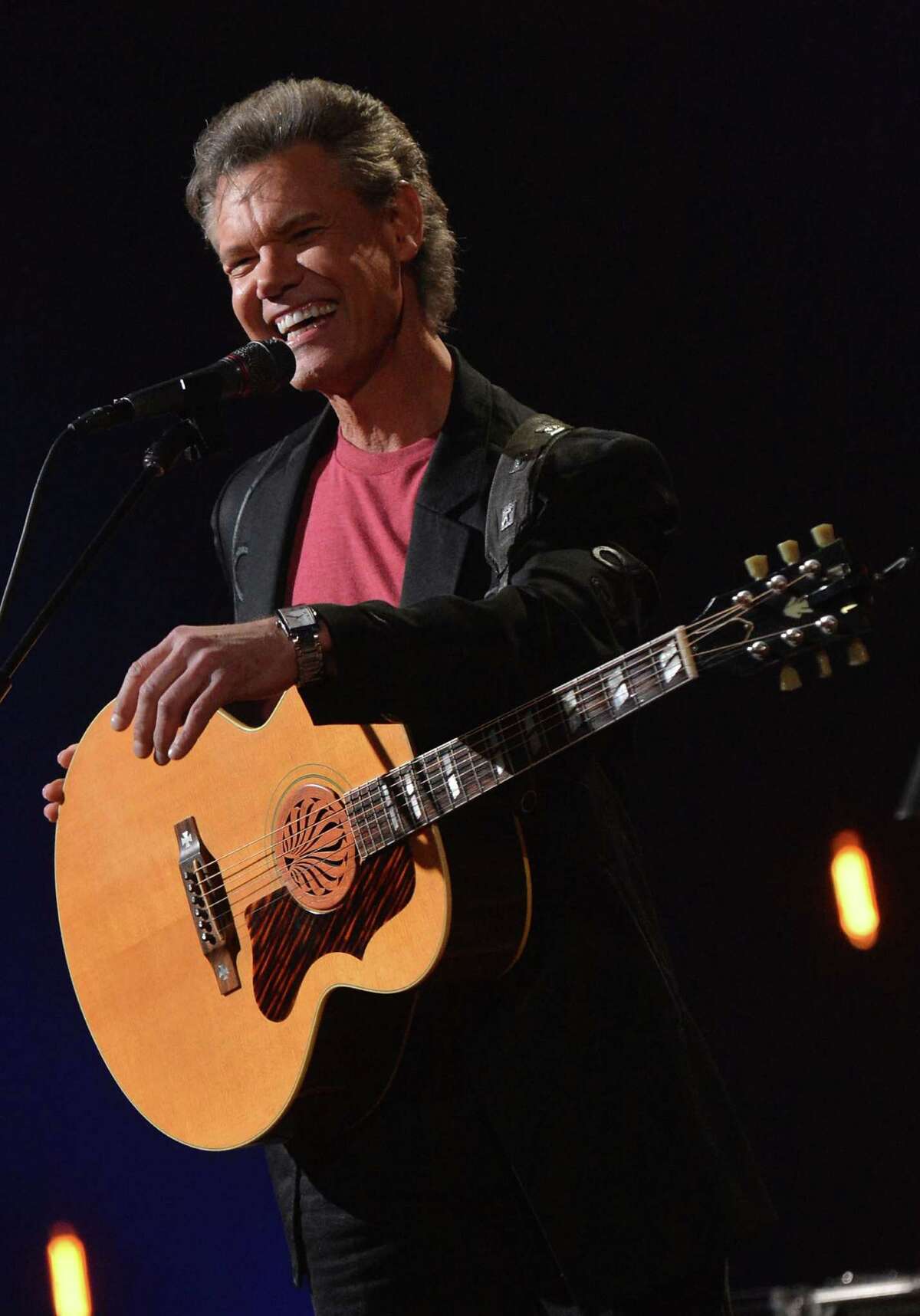 Despite recent troubles, Randy Travis continues to perform before sell-out crowds. Getty Images