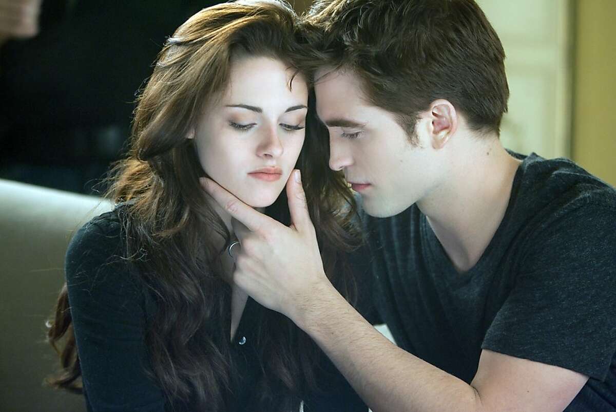This film image released by Summit Entertainment shows Kristen Stewart, left, and Robert Pattinson in a scene from "The Twilight Saga: Breaking Dawn Part 2." (AP Photo/Summit Entertainment, Andrew Cooper)