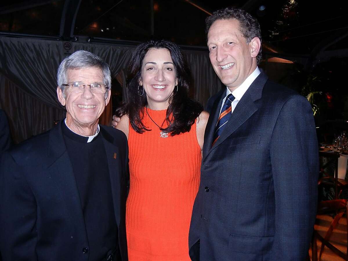 University of San Francisco President Father Stephen Privett (left) with Pam Baer and her husband, Giants CEO Larry Baer at USF's California Prize dinner. Nov 2012. By Catherine Bigelow. NOTE: Pls make sure this is the lede photo. Thnx!