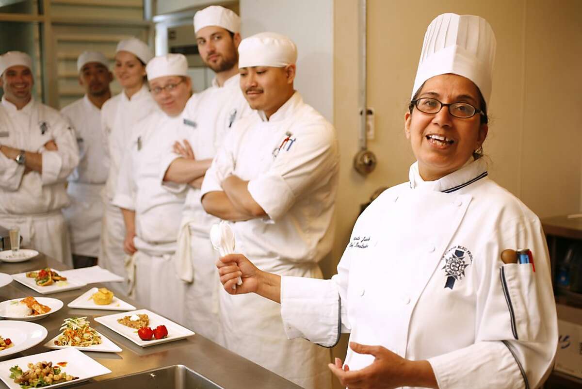 Chef Vinita Jacinto (right),and instructor, during critique in the Contemporary Cuisine class at the California Culinary Academy in San Francisco, Calif. on July 23, 2008. Chef Vinita Jacinto teaches chefs about being environmentally friendly, incorporating organic products and how to make vegetarian and vegan foods. Photo by Craig Lee / The Chronicle