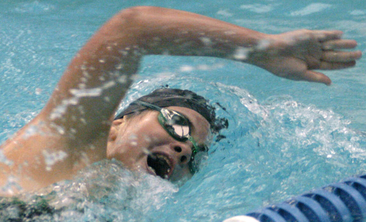 Jena Hook churns her way to a strong finish for New Milford HIgh School girls' swim vs. Bunnell at Canterbury School, Oct. 9, 2012