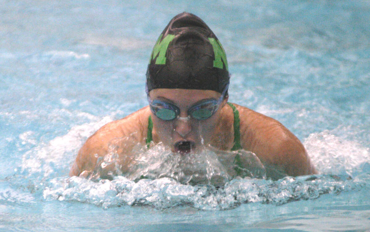 Julia Krier of the Green Wave competes for New Milford HIgh School girls' swim vs. Bunnell at Canterbury School, Oct. 9, 2012