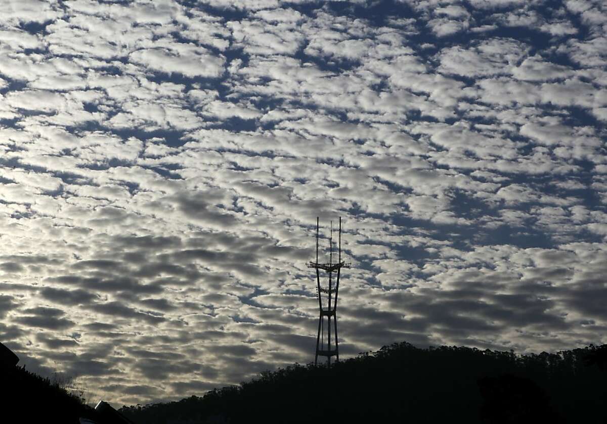 Light clouds from the leading edge of a rainstorm provide a backdrop for Sutro Tower in San Francisco, Calif. on Thursday, Nov. 15, 2012.