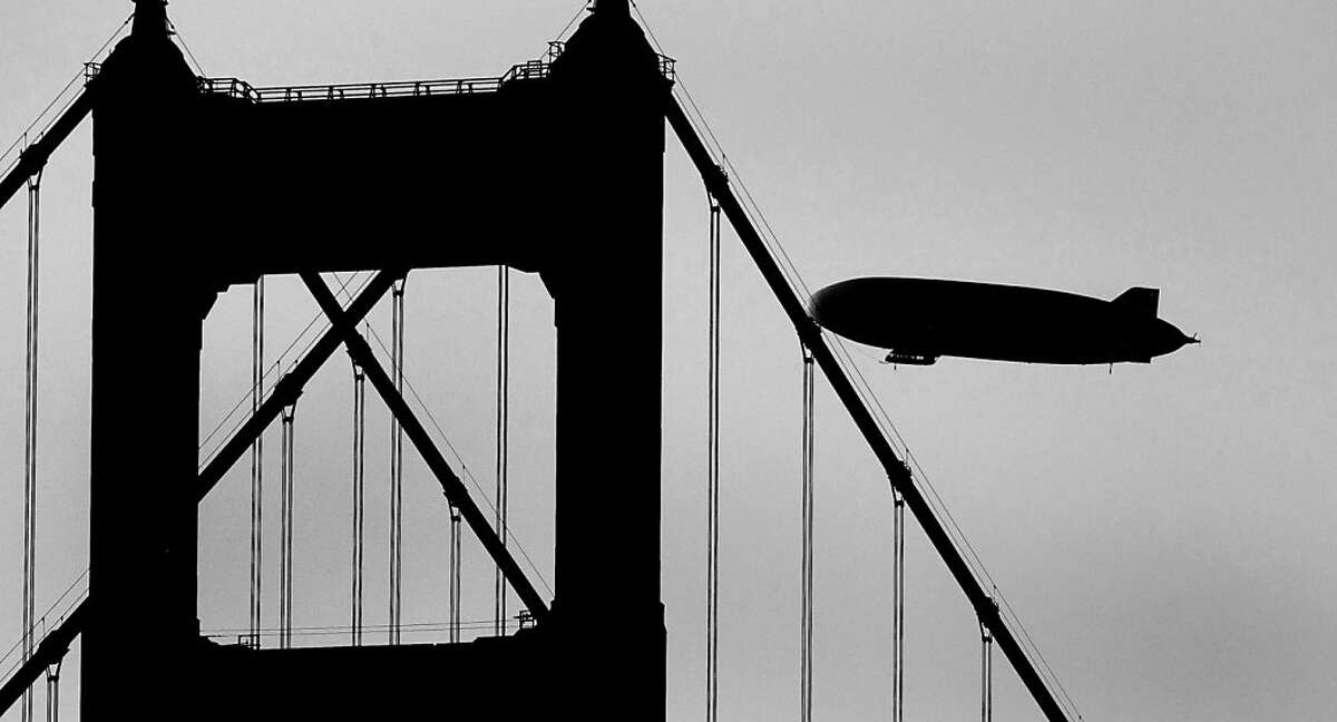 Airship Ventures was up early as it flew its Zeppelin airship during a sunrise sightseeing flight over the Golden Gate Bridge on March 24, 2009.