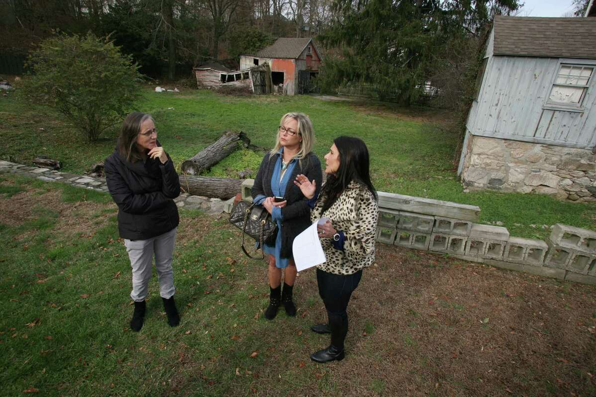 Cos Cob neighbors, from left, Nicole Cranberg Crosby, Debra Brandt and Valerie Olivieri are some of the residents who met Friday, Nov. 16, 2012, to discuss the impact the constuction of the new Greenwich Reform Synagogue on Orchard Street would have on their neighborhood.