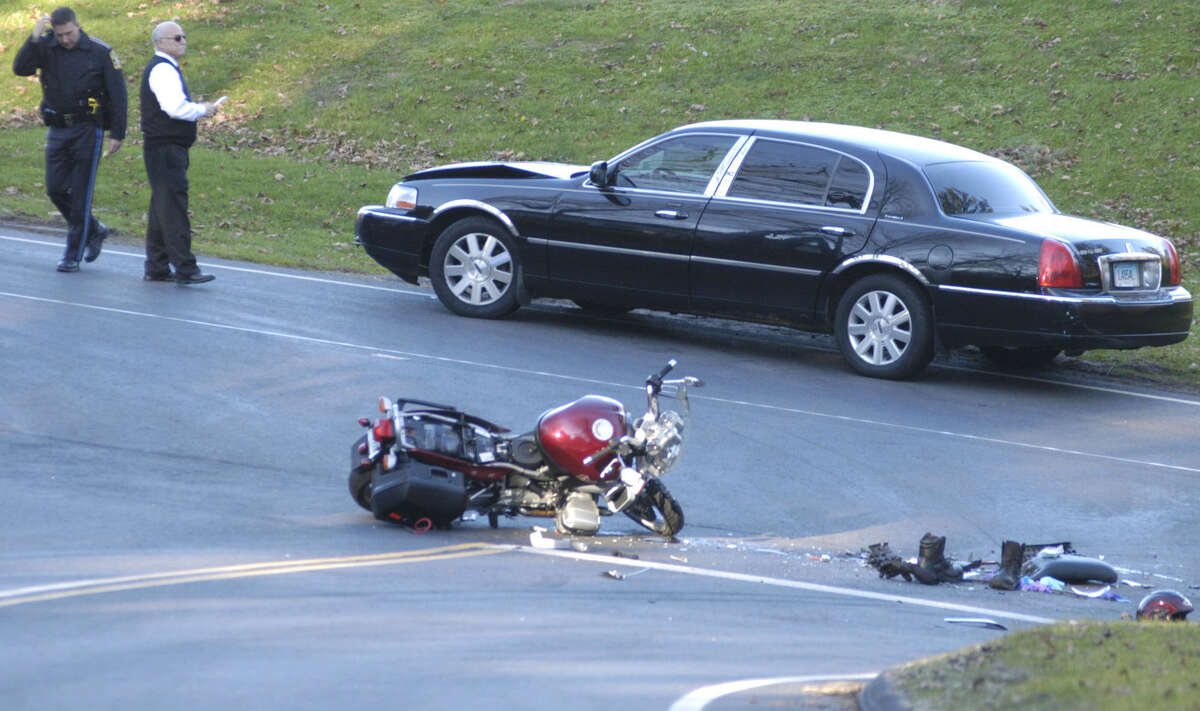 Motorcycle rider unconscious after crash