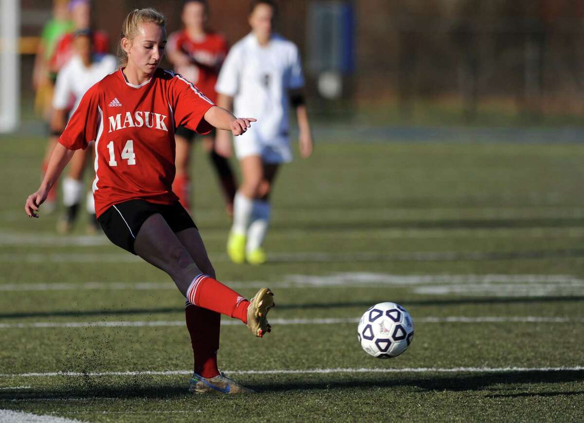 Masuk's Raine Oesterle controls the ball during the Class L semifinals against East Lyme Saturday, Nov. 17, 2012 at Municipal Stadium in Waterbury, Conn.