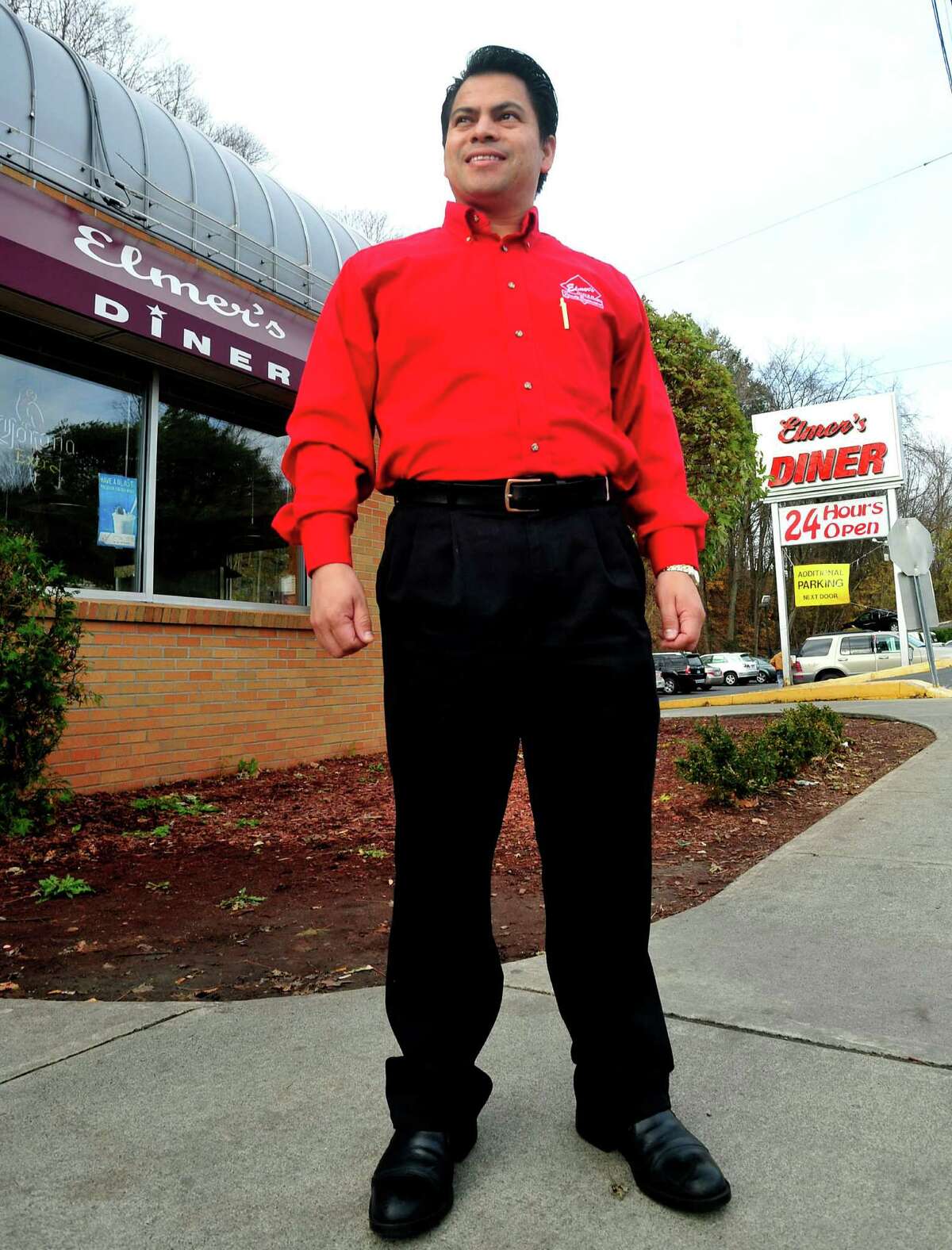 Elmer Palma stands outside his Danbury business, Elmer's Diner, Friday, Nov. 16, 2012. Palma serves as a member of the Danbury Zoning Commission.
