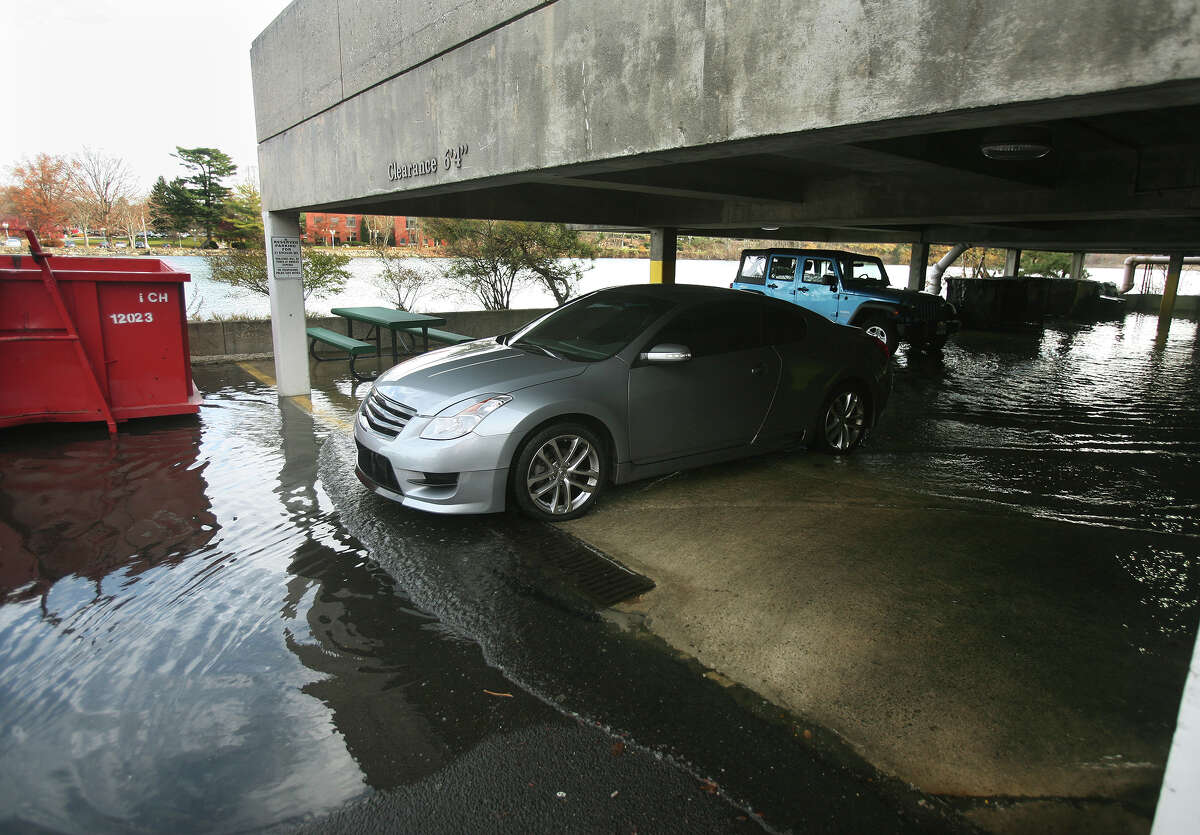 Westport: 4.97 inches Pictured: The lower level of a parking garage floods at high tide on Riverside Drive in Westport on Thursday, November 15, 2012. (File photo)