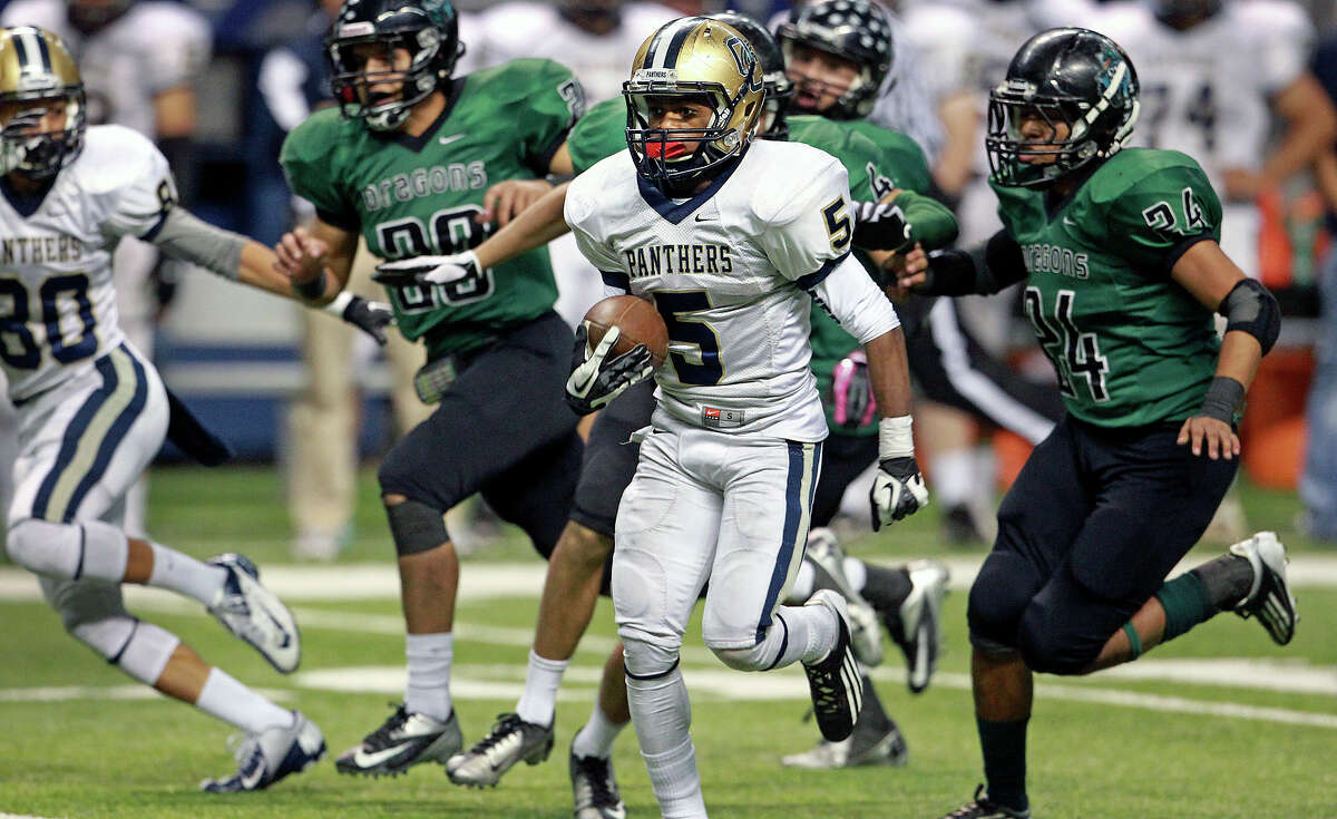 Tre Johnson rolls for a 63 yard touchdown in the third quarter for the Panthers as O'Connor plays Southwest in first round 5A playoff action at the Alamodome on November 17, 2012.
