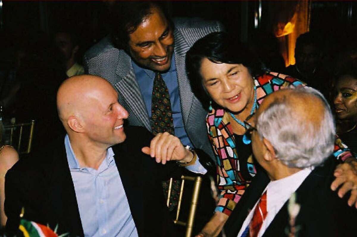 At a Vanguard-sponsored gala for South African anti-apartheid activist Ahmed Kathrada (right) in 2005, former Vanguard President Hari Dillon (second from left) hobnobs with Kathrada, civil rights activist Dolores Huerta (second from right) and Mouli Cohen (left), a self-described millionaire entrepreneur who scammed Dillon and Vanguard donors out of millions of dollars.