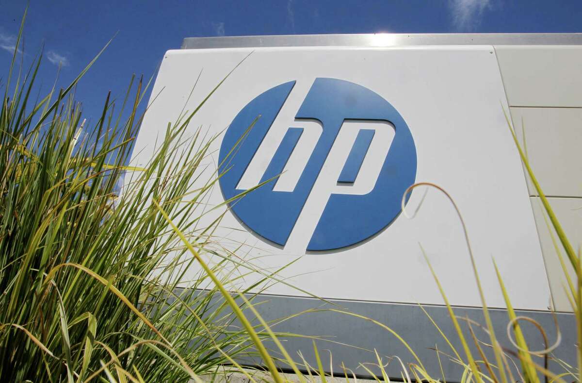 In this Aug. 21, 2012 photo, the Hewlett-Packard Co. logo is seen outside the company's headquarters in Palo Alto, Calif. HP said Autonomy Corporation PLC, a British company it bought for $10 billion last year, lied about its finances, resulting in a massive write-down of the value of the business. HP?s net loss for the fiscal fourth quarter, which ended Oct. 31, amounted to $6.85 billion, or $3.49 per share. (AP Photo/Paul Sakuma)