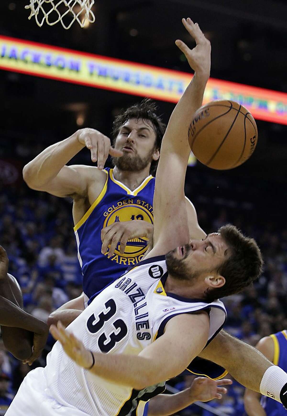 Memphis Grizzlies' Marc Gasol (33) has his shot blocked by Golden State Warriors' Andrew Bogut during the first half of an NBA basketball game Friday, Nov. 2, 2012, in Oakland, Calif. (AP Photo/Ben Margot)