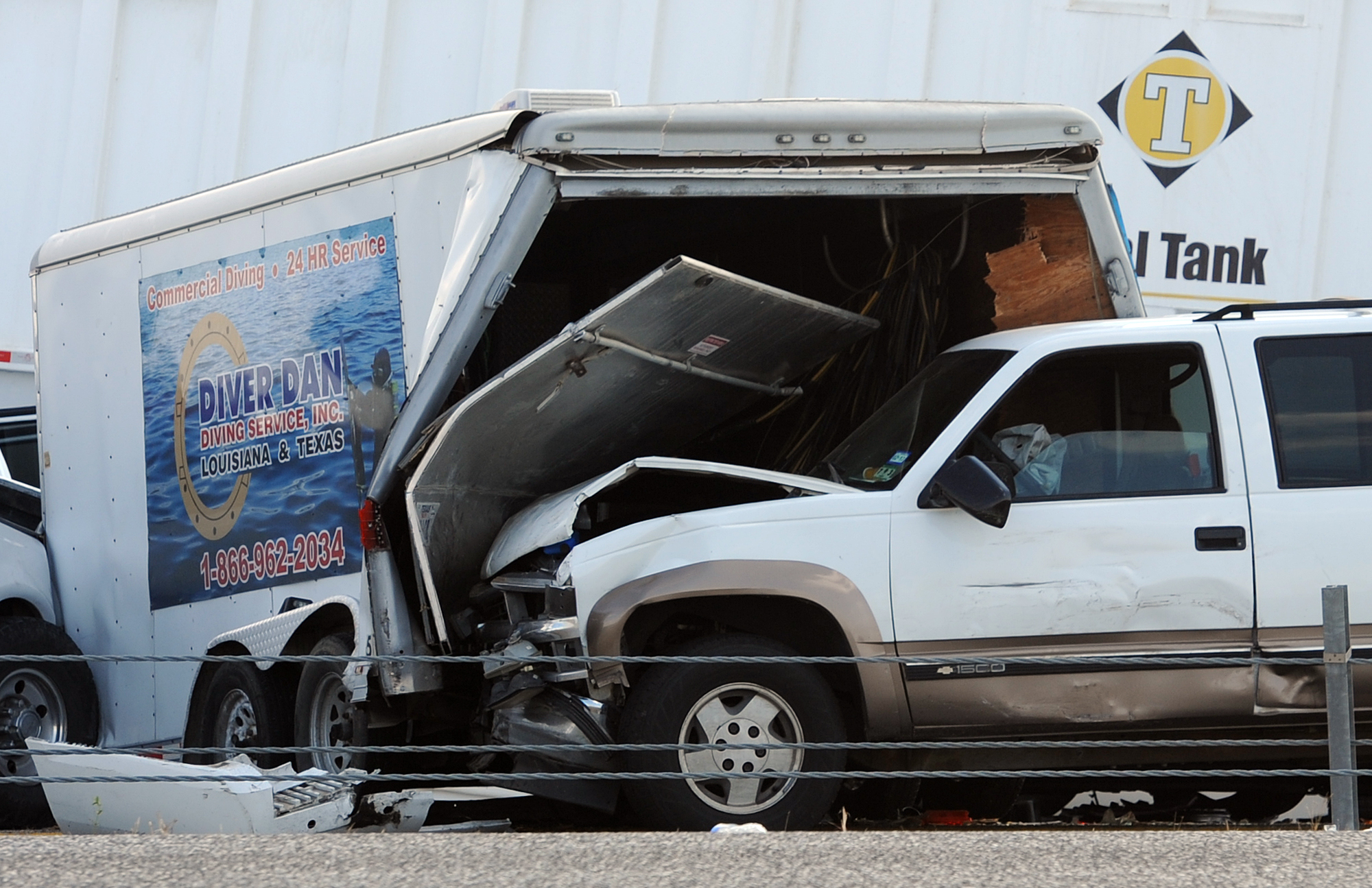 Wrecked cars, trucks await insurers