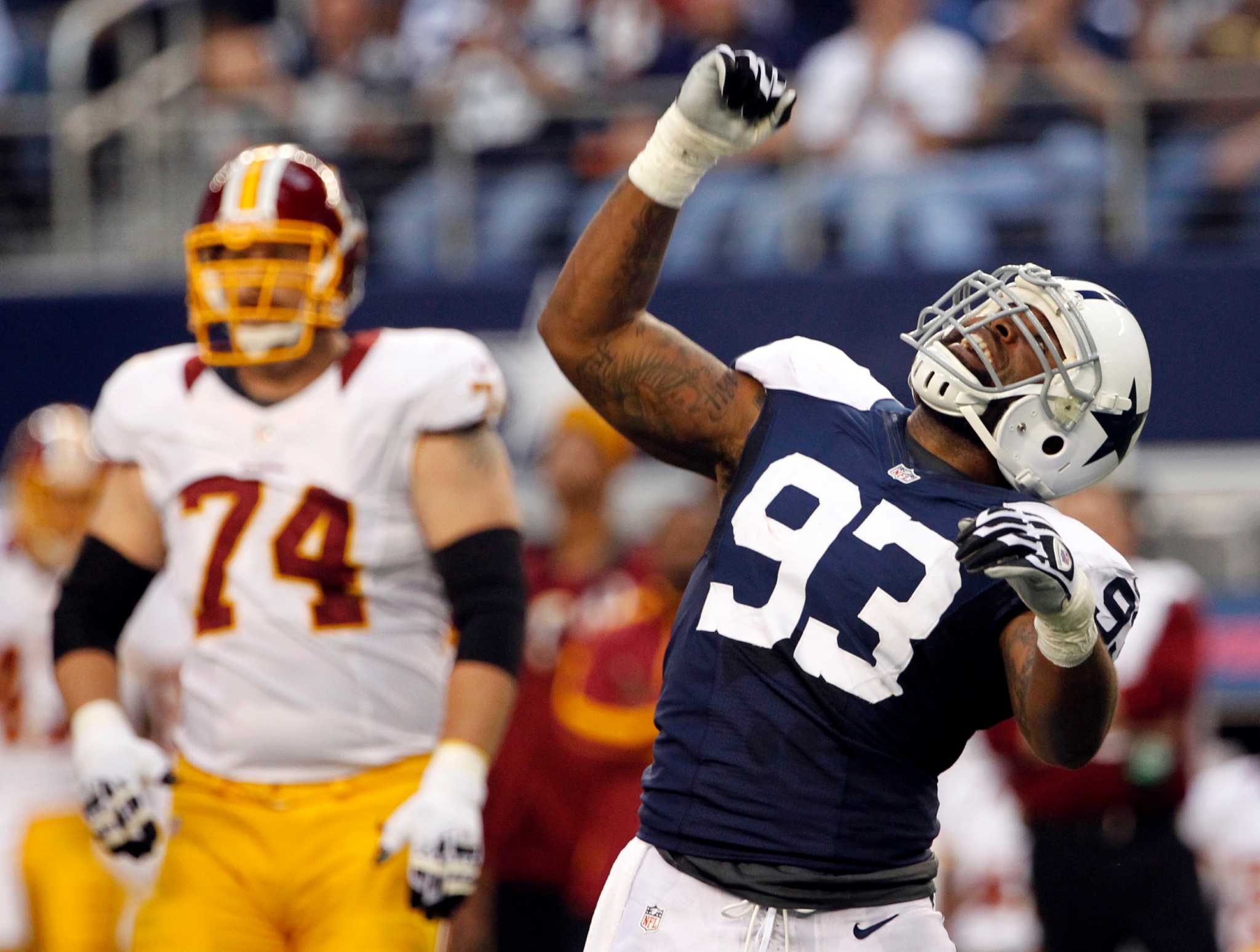 Dallas Cowboys linebacker DeMarcus Ware (94) celebrates after he sacked  Philadelphia Eagles Nick Foles in the first quarter at Cowboys Stadium in  Arlington, Texas, on Sunday, Dec. 2, 2012. Ware has been