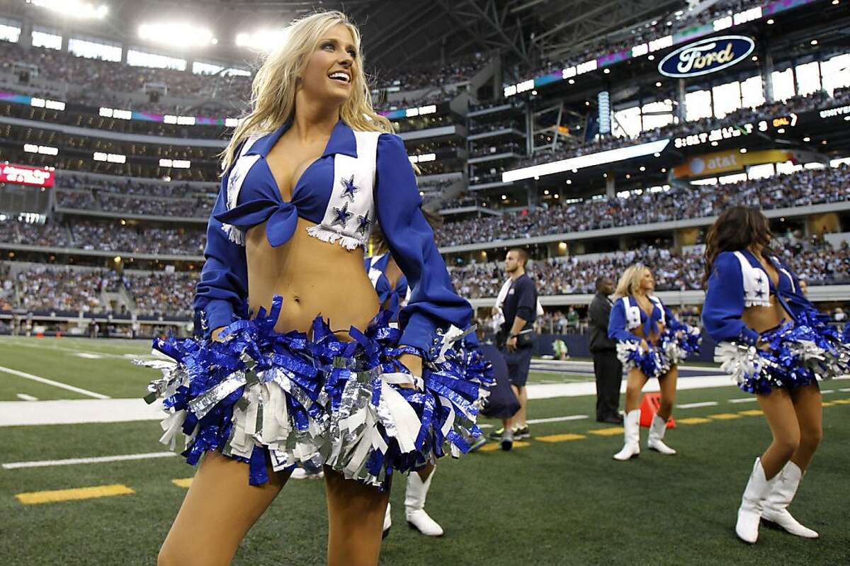 Dallas Cowboys Cheerleaders perform during an NFL football game