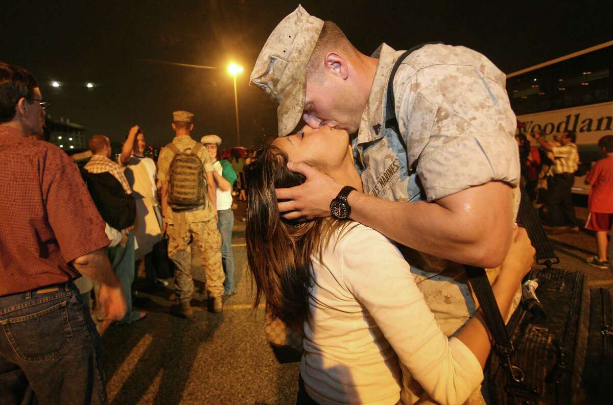 Who: Becky Garcia and her fiance, Cpl. Jeff Allison. When: April 26, 2008. Where: Houston. Details: Allison arrived at a reserve center after seven months in Iraq.