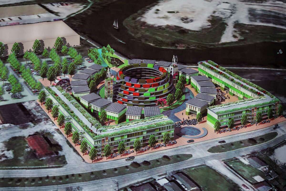 A rendering of HIVE, a real-estate development scheme conceived by Nestor Topchy, at his studio, Monday, Nov. 12, 2012, in Houston. HIVE will consist of a giant beehive-shaped spiral made of shipping containers and cater to artists and small businesses. Nestor Topchy's scheme has been exhibited as art, but now the development team is in negotiations for a site owned by the Buffalo Bayou Partnership. ( Michael Paulsen / Houston Chronicle )