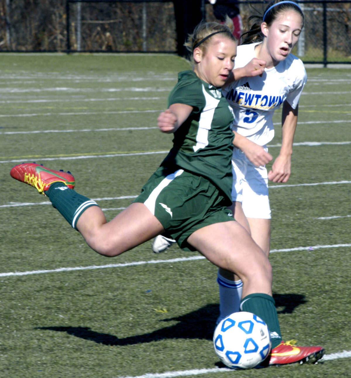 The Green Wave's Jen Millar during New Milford High School girls' soccer's state class 'LL' semifinal match vs. Newtown in Waterbury. Nov. 17, 2012