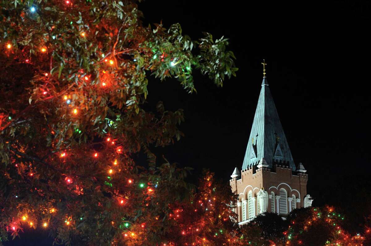 The steeple on the Chapel of the Incarnate Word is framed by "Light the Way" Christmas lights on Saturday, Nov. 24, 2012. The lights were lit on November 17 and will shine through January 6, 2013.