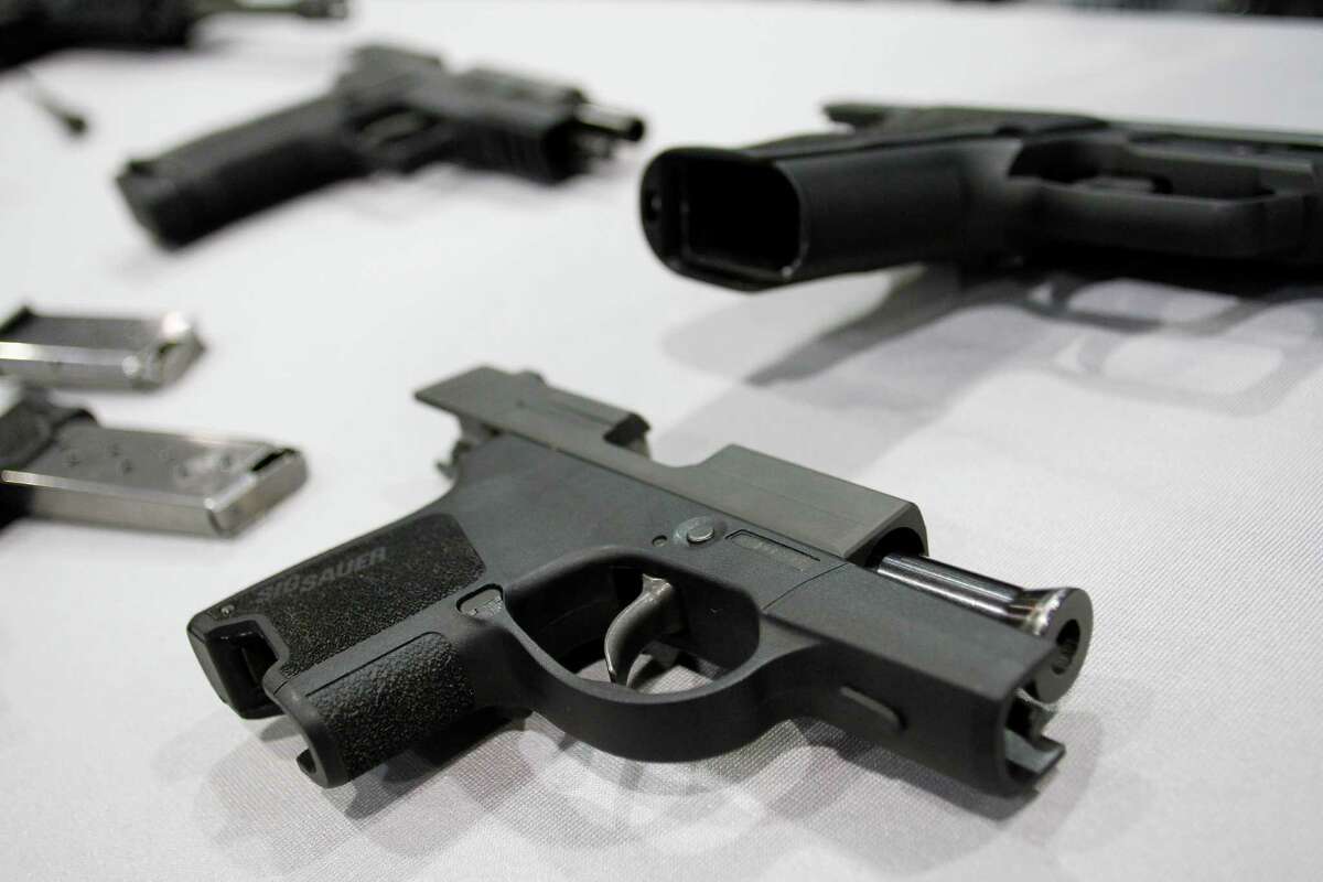 A Sig Sauer P290 micro 9mm pistol on display at at the Border Security Expo in Phoenix, March 6, 2012. (Joshua Lott/The New York Times)