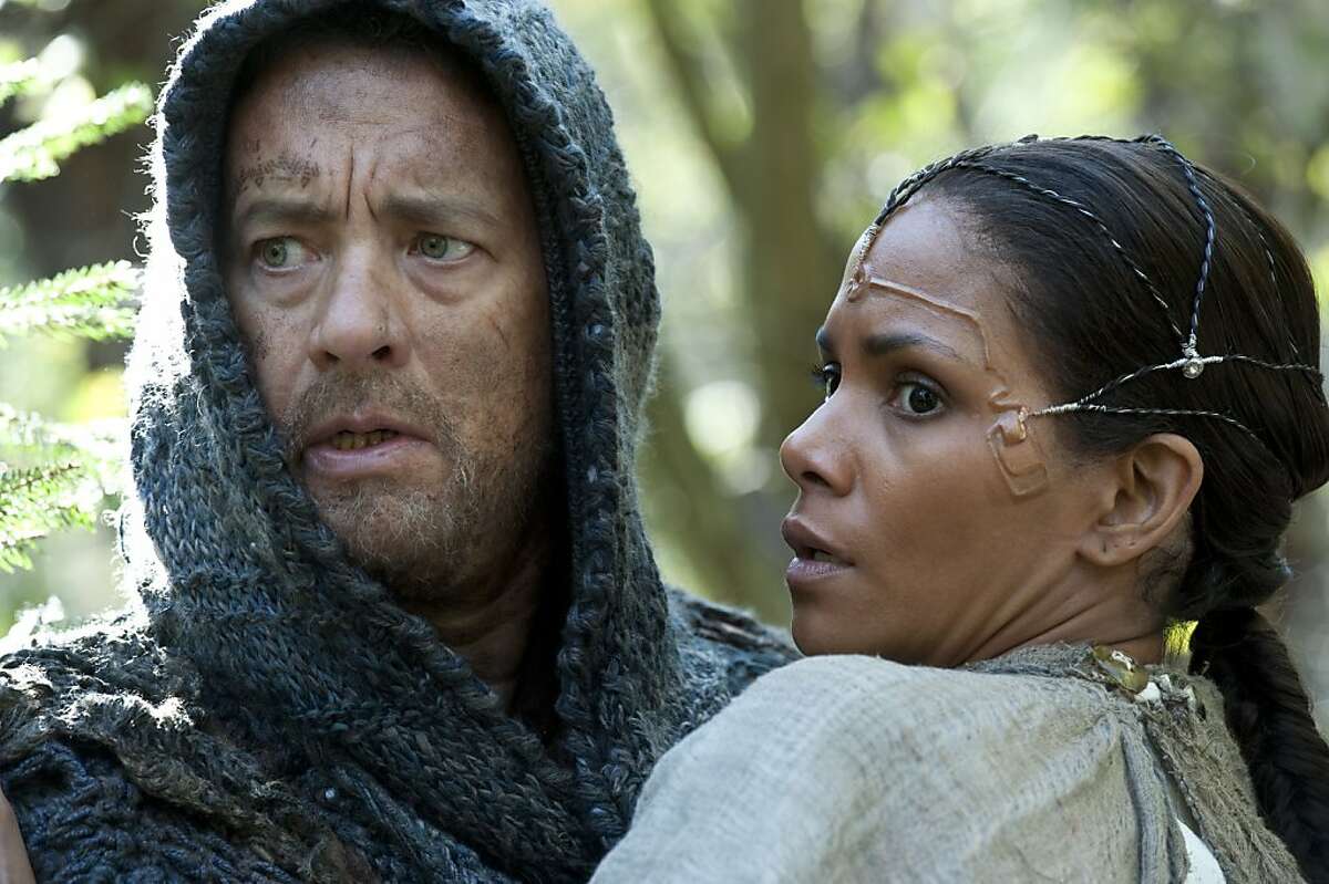 This film image released by Warner Bros. Pictures shows Tom Hanks as Zachry and Halle Berry as Meronym in a scene from "Cloud Atlas," an epic spanning centuries and genres. (AP Photo/Warner Bros. Pictures, Jay Maidment)