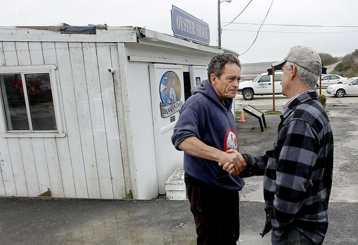 The owner of the Tomales Bay Oyster company Todd Friend, (left) stopped by to talk with the Drakes Bay Oyster Company owner Kevin Lunny, (right) after hearing the news of the closure on Thursday Nov. 29, 2012, in Point Reyes, Calif. U.S. Interior Secretary Ken Salazar rejected a proposal to extend the lease of the popular Drakes Bay Oyster Farm at Point Reyes National Seashore Thursday, effectively ending more than a century of shellfish production on the 1,100 acres in Drakes Bay.