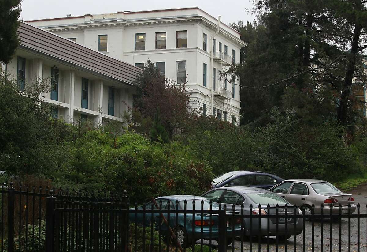 Buildings on the Fred Finch Youth Center campus are seen in Oakland, Calif. on Friday, Nov. 30, 2012. Authorities are searching for suspects believed to have severely beaten a 16-year-old autistic girl who walked away from the facility Tuesday night.