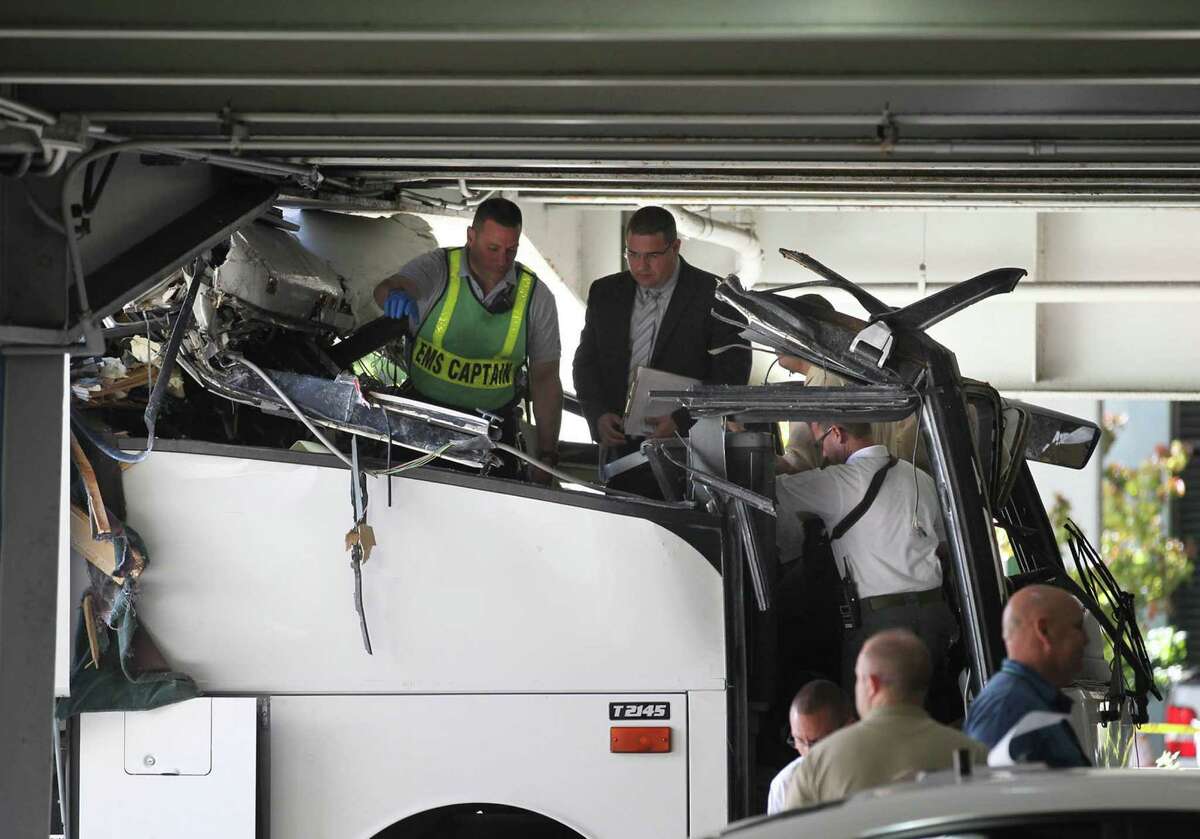The bus that crashed into an overpass in Miami was so badly damaged that rescuers had to use the Jaws of Life tool to cut into the vehicle. Jehovah Witnesses were on the bus heading to a conference.