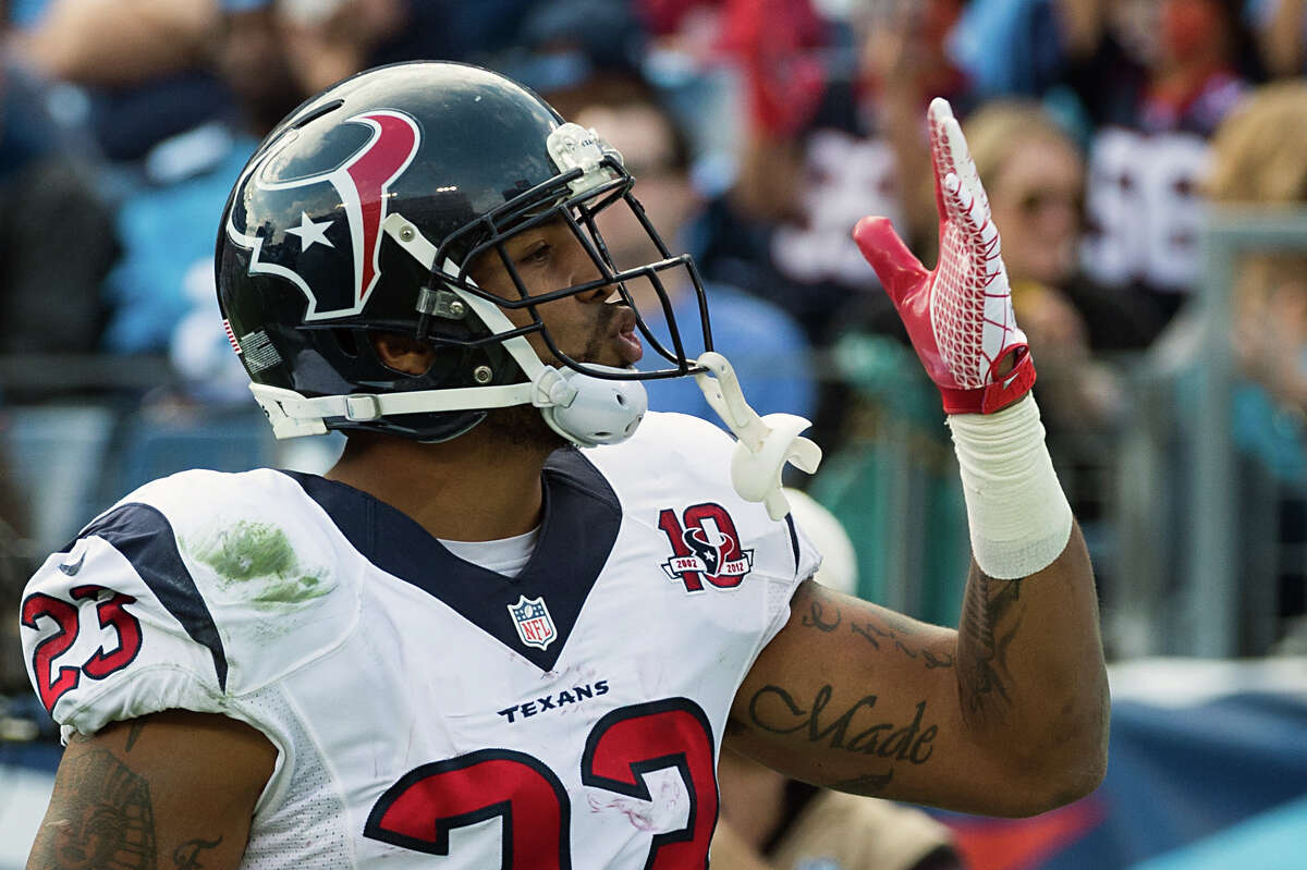 Texans running back Arian Foster blows a kiss to the hostile crowd after scoring a touchdown.