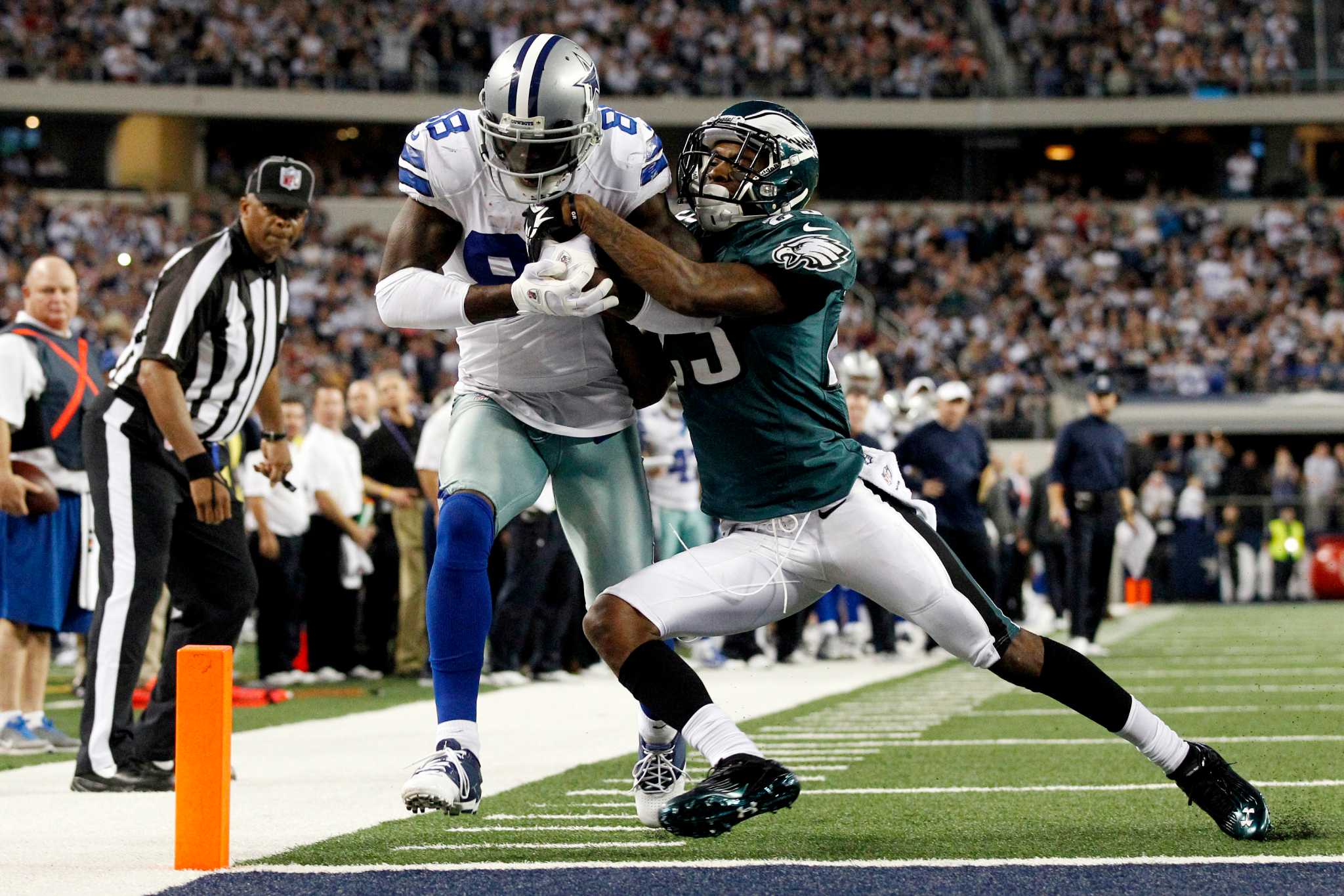 Dallas Cowboys linebacker DeMarcus Ware (94) celebrates after he sacked  Philadelphia Eagles Nick Foles in the first quarter at Cowboys Stadium in  Arlington, Texas, on Sunday, Dec. 2, 2012. Ware has been