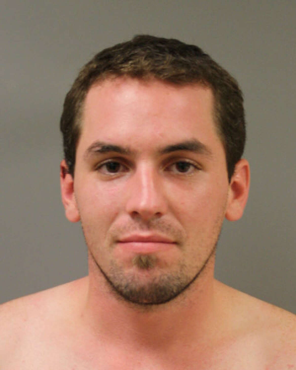 Andrew Abernathy, accused of breaking into a woman's apartment naked, was arrested and charged with criminal trespass.