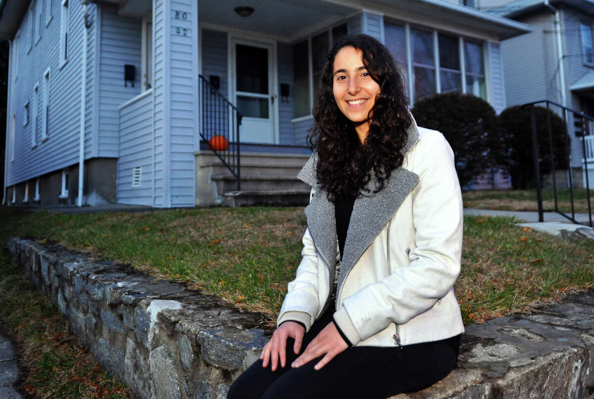 Nora Weiss, who found a black widow spider in grapes she purchased at Whole Foods, poses at her home on Woodland Avenue in Bridgeport, Conn. on Tuesday December 4, 2012.
