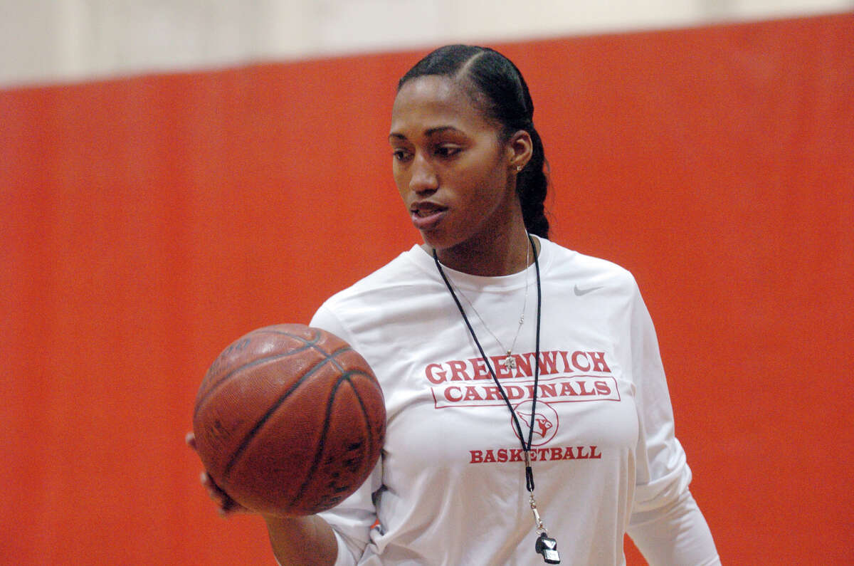 Greenwich High School girls basketball Coach Chrys Hernandez holds practice at the school in Greenwich, Conn., Dec. 4, 2012.