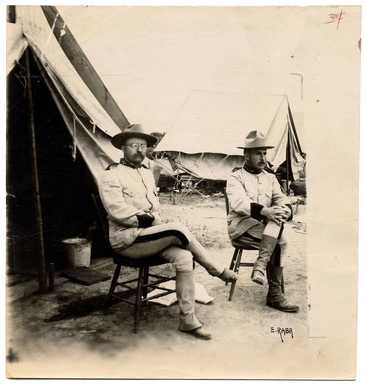 Theodore Roosevelt - Before becoming Vice President and eventually President, Roosevelt came to San Antonio in 1898 to train with the U.S. 1st Volunteer Cavalry, the “Rough Riders” who won fame during the battle on San Juan Hill in the Spanish American War. Ernst Raba of San Antonio took this photo of Lt. Col. Theodore Roosevelt (left) and Col. Leonard Wood three months before the charge up San Juan Hill in Cuba.