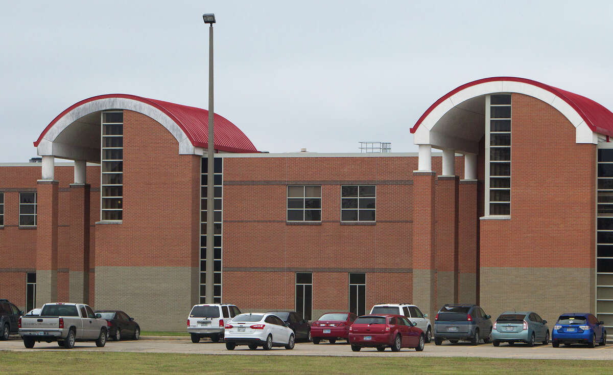 Texas student shoots himself while cuffed in police car