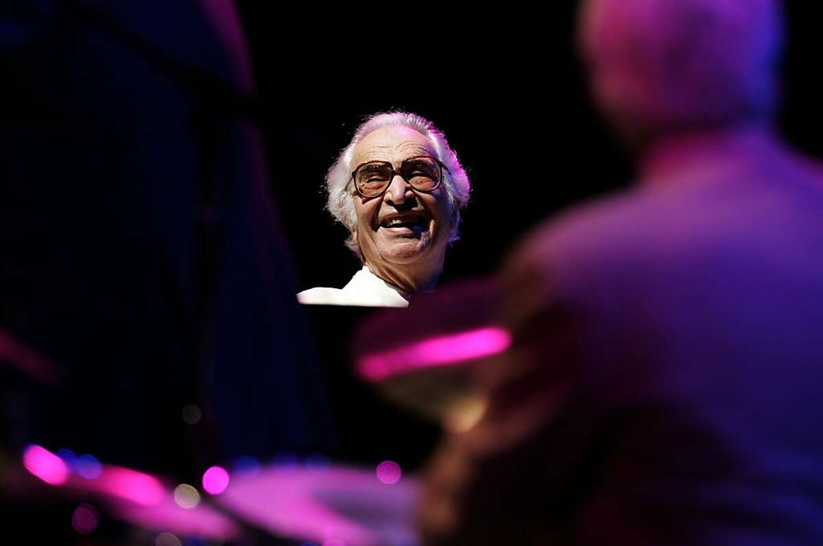 Dave Brubeck reacts to a Bobby Militello sax solo at Villa Montalvo during a performance on Aug. 26, 2005. San Francisco photographer Kim Komenich joined jazz legend Dave Brubeck, 85 at the time, and his wife Iola and his quartet (Bobby Militello sax, Michael Moore, bass and Randy Jones, drums) on a two-day tour through the Central Valley, where he was raised. Brubeck's gigs include Villa Montalvo in Saratoga on Aug. 26th, and Outdoor Grove in Sacramento on Aug. 27.