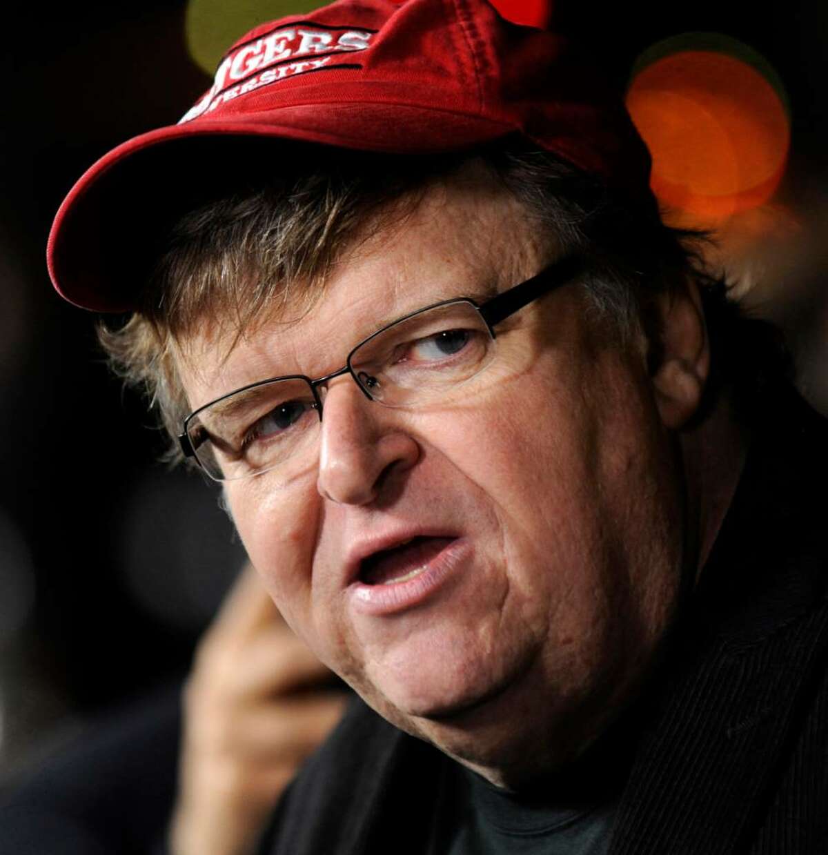 FILE - This Sept. 15, 2009, file photo shows filmmaker Michael Moore at the Academy of Motion Picture Arts and Sciences in Beverly Hills, Calif. On Thursday, Dec. 17, 2009, Moore called for a boycott of the state of Connecticut because of his opposition to Sen. Joe Lieberman's stand on universal healthcare. (AP Photo/Chris Pizzello, File)