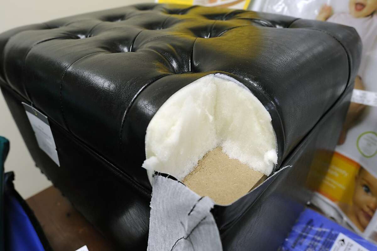 An ottoman is seen with a section of it's foam cut out for testing at the Center for Environmental Health's offices in Oakland, CA Wednesday December 5th, 2012. The Center for Environmental Health, a local watchdog group, announced Thursday it is suing Walmart, Babies 'R' Us, Target and other major national retailers for selling foam-filled baby and child care products with high levels of a known carcinogen. TDCPP, or chlorinated Tris.