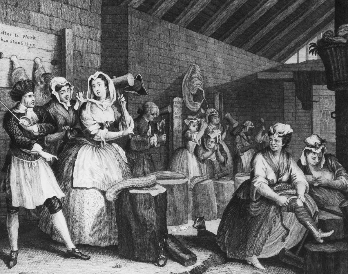 A scene in Bridewell Prison, where the harlot Moll Hackabout is sentenced to beat hemp, on Plate 4 of 'The Harlot's Progress' by William Hogarth, 1732. An engraving by S. Davenport after Hogarth.