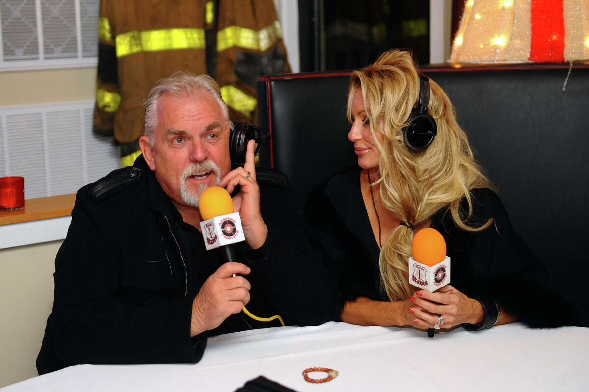 Black Rock native John Ratzenberger and his wife Julie take part in a live broadcast of the Modern Problems Radio Show at the Fire Engine Pizza Company restaurant on Fairfield Avenue in the Black Rock section of Bridgeport, Conn. on Thursday December 6, 2012.