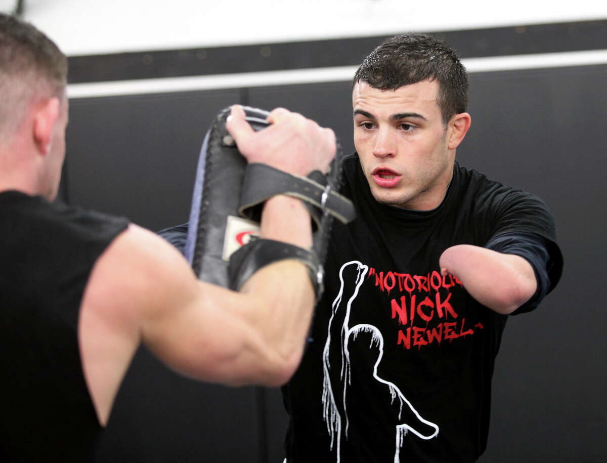 Nick Newell, of Trumbull, trains at Ultimate MMA Gym in NorthHaven, Conn. on Monday, December 3, 2012. Newell competed for the mixed martial arts XFC extreme fighting championship lightweight title on Friday Dec. 7th in Nashville, TN.