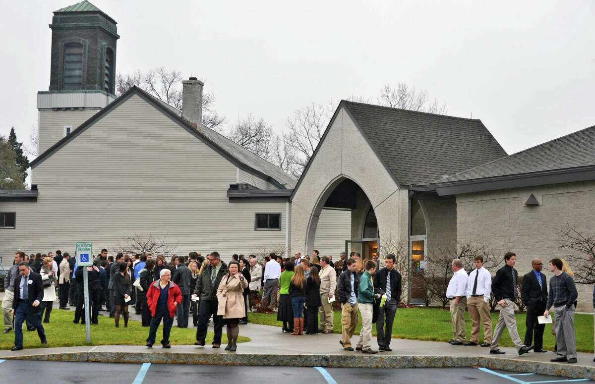 Mourners outside Corpus Christi Church in Round Lake Saturday Dec. 8, 2012, following funeral services for Chris Stewart, the 17-year-old Shenendehowa student who died along with classmate Deanna Rivers in a crash on the Northway that left two other teens injured. (John Carl D'Annibale / Times Union)