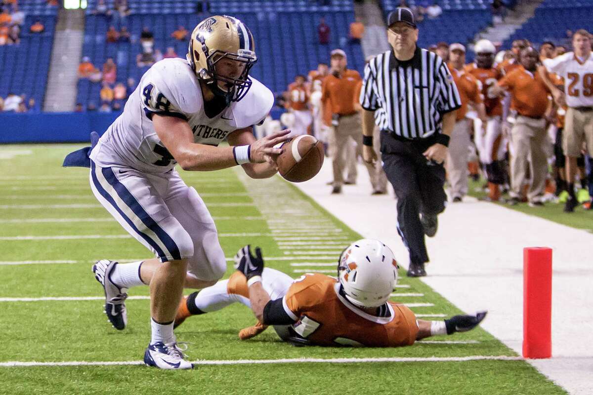 O'Connor's Clay Lansdale pulls in a thirteen yard touchdown reception during the fourth quarter of their Class 5A Division I state quarterfinal game with Madison at the Alamodome on Dec. 8, 2012. O'Connor beat the Mavericks 52-49. MARVIN PFEIFFER/ mpfeiffer@express-news.net