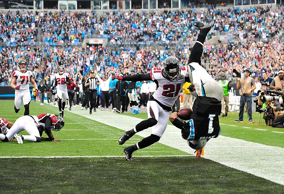 Carolina Panthers tackle Jordan Gross runs onto the field during