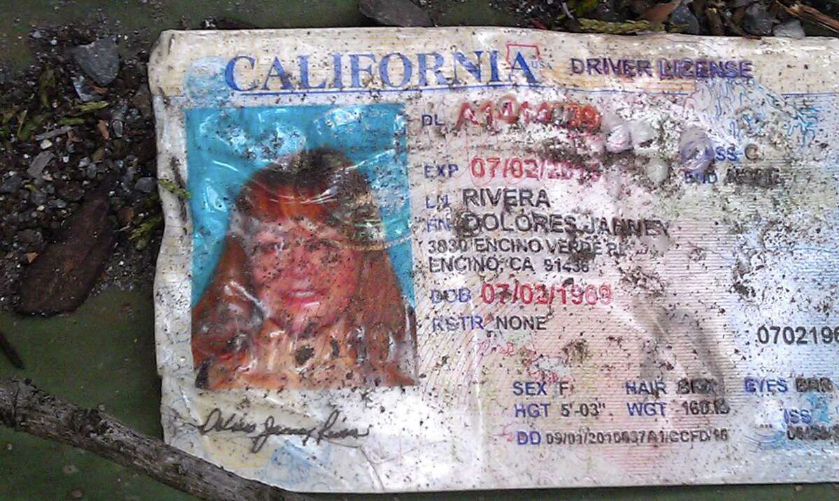 Jenni Rivera's driving license is seen of the ground at the crash site where a plane allegedly carrying Rivera crashed near Iturbide, Mexico Sunday Dec. 12, 2012. The wreckage of a the small plane believed to be carrying Jenni Rivera, the U.S-born singer whose soulful voice and unfettered discussion of a series of personal travails made her a Mexican-American superstar, was found in northern Mexico on Sunday. Authorities said there were no survivors.