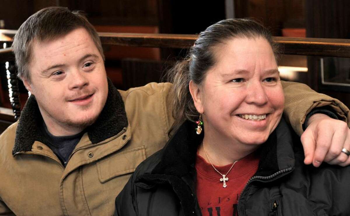 Kristopher Mann, 27, and Cindy Martin, 44, of Danbury, on Saturday, Dec.12,2009.